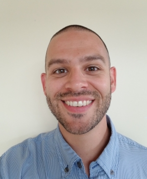 Portrait of Dennis smiling